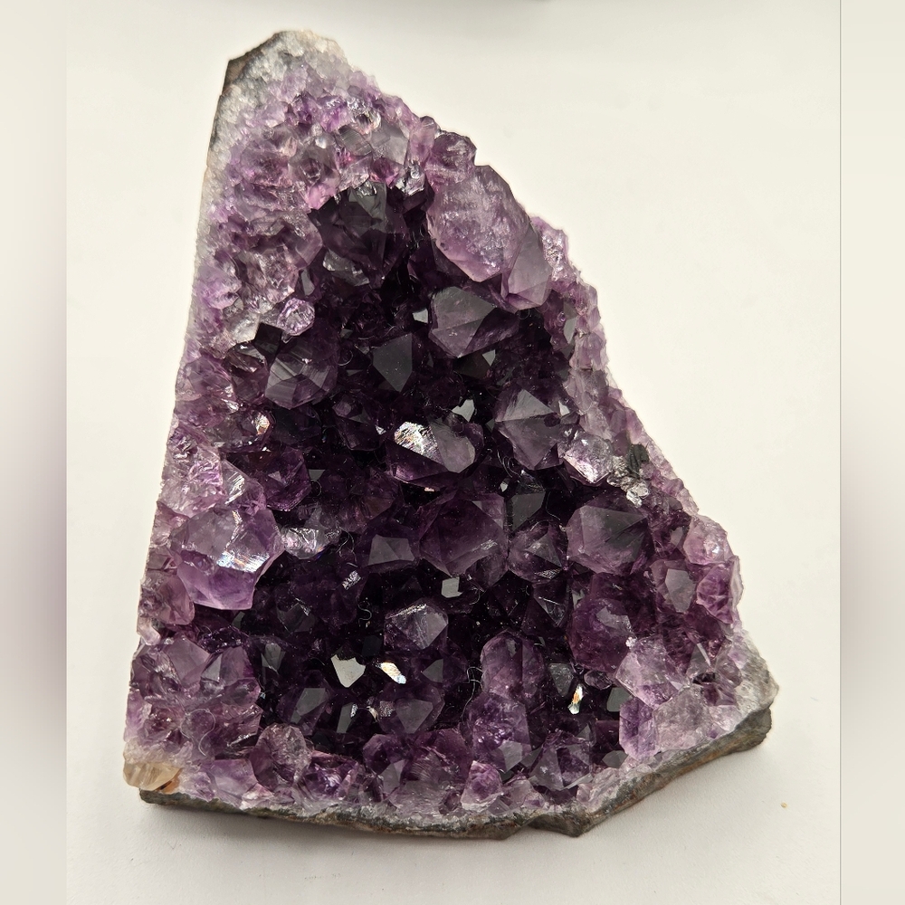 Deep Purple Project NIB Natural Amethyst Crystal geodes, primarily from Uruguay